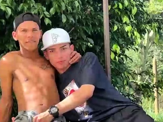 Gay blowjob outdoors in the sun