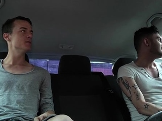 Gay dude favors his boyfriend with a blowjob in a car
