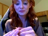 Redhead babe masturbates in the bathtube
